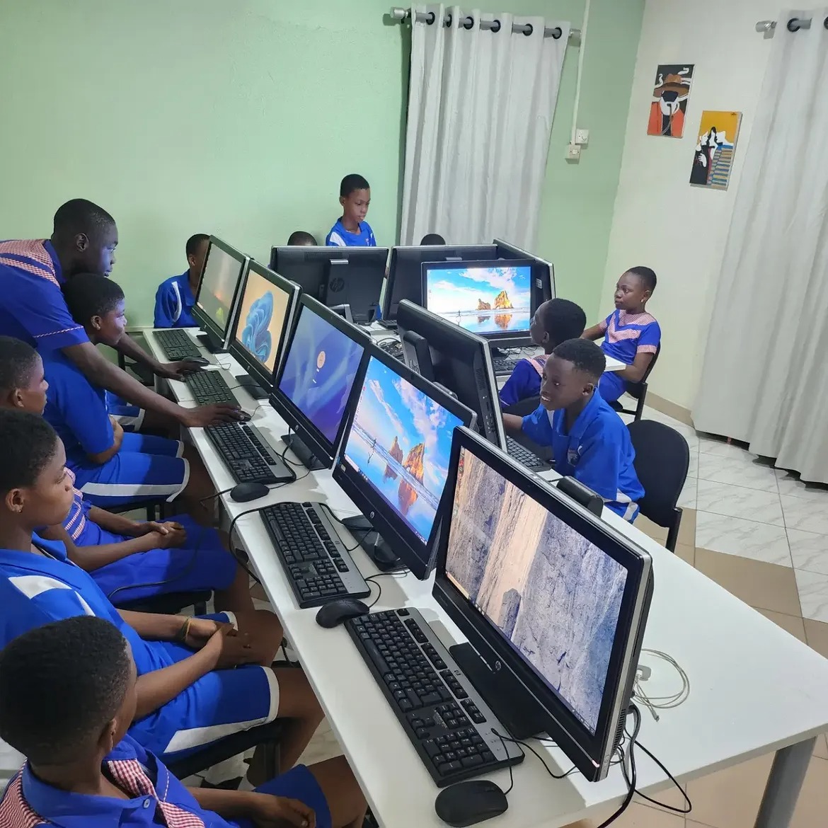 Learners working at computers in the St. Jude's ICT room